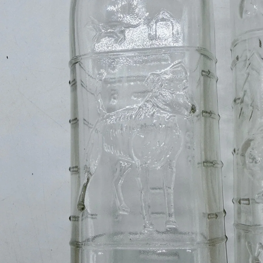 Vintage Embossed Glass‎ Milk Bottle Dog and Rabbit Scene Set of 2